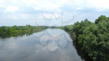 beautiful landscape with river and white clouds