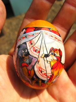 image of Easter egg with drawing in hand