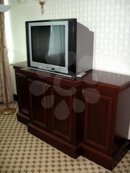 image of comfort room with big TV in hotel