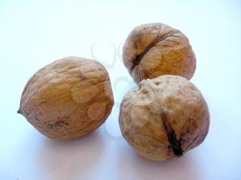 image of heap of ripe three walnuts