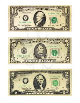 Banknotes of the American dollars face value 2, 5 and 10 dollars isolated on a white background