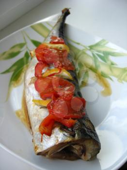 image of dish with mackerel of cold smoking and pieces of lemon
