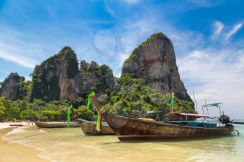 Traditional long tail boat on Railay Beach, Krabi, Thailand in a summer day