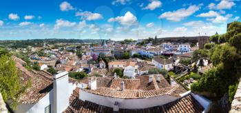 Panoramic aerial view of medieval town Obidos in a beautiful summer day, Portugal