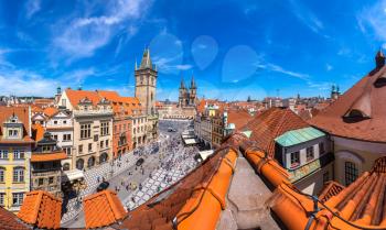 Panoramic aerial view of Old Town square and Clock Tower in Prague in a beautiful summer day, Czech Republic