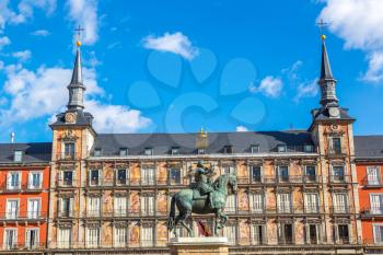 Plaza Mayor and statue of King Philips III in Madrid, Spain in a beautiful summer day