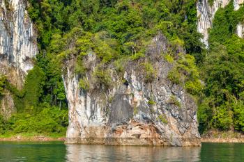 Beautiful nature at Cheow Lan lake, Ratchaprapha Dam, Khao Sok National Park in Thailand in a summer day