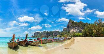 Panorama of Traditional long tail boat on Railay Beach, Krabi, Thailand in a summer day