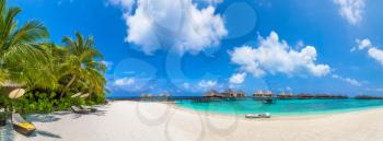 Panorama of Tropical beach in the Maldives at summer day