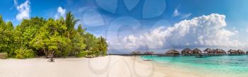 Panorama of Tropical beach in the Maldives at summer day