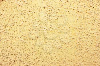 Old  yellow wall stucco texture.