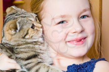 Image of beautiful girl with grey kitty