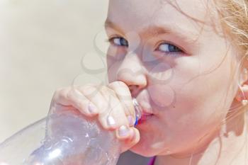 Photo of cute girl with drinking water