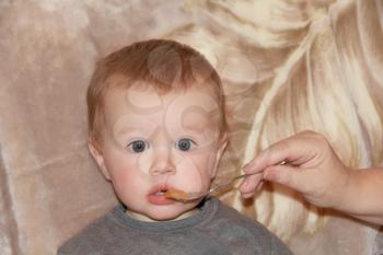 Image of cute eating baby 1 year