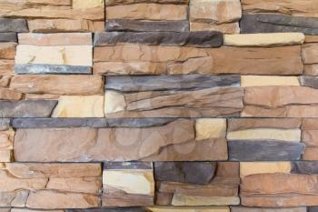 Photo stone wall of brown masonry texture