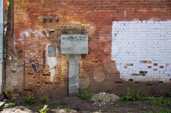 Photo of old red brick gritty wall