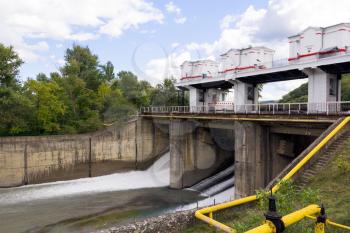 Photo of hydraulically dam in summer time