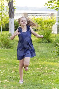 Cute running European girl with disheveled hair