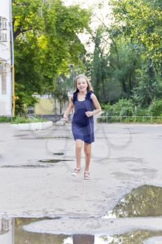 Cute running European girl with disheveled hair