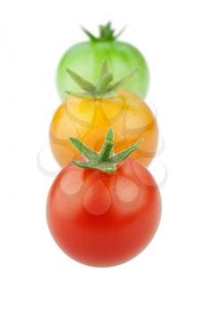 Cherry tomatoes tricolor. Red orange and green.