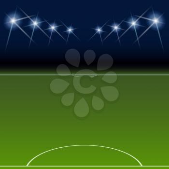 Football field with flood lights, night view, backgrounds for your messages, designs and presentations