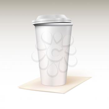 Paper cup for coffee standing on a napkin. Template for your design.