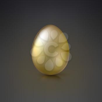 Golden Egg with glare and reflections on dark background.