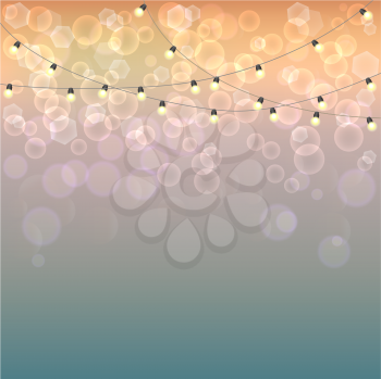 Blurred background with bokeh effect and garland with lamps. Cool template for design, presentations and other documents