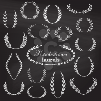 Hand-drawn page decorations, flourishes and design elements on chalkboard background.