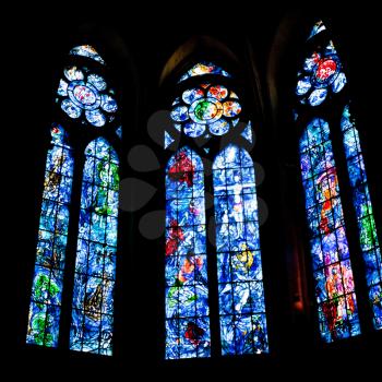 REIMS, FRANCE - JUNE 29: stained glass windows in Cathedral in Reims, France on June 29, 2010. Chapel stained glass windows were designed by Marc Chagall in 1974.