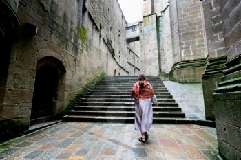 MONT SAINT-MICHEL, FRANCE - JULY 5: inner yard of Mont Saint-Michel in France on July 5, 2010. More than 3000000 people visit Saint Michael's Mount each year.