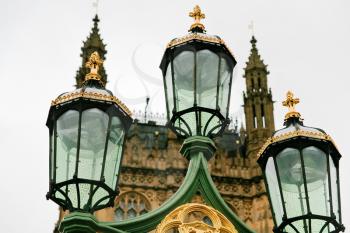 street lamps in London with Westminster Palace on background