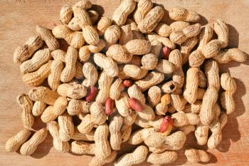 roast peanuts on wooden board outdoor
