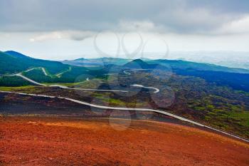 serpentine road on slope of volcano Etna, Sicily