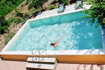 open air swimming pool in country house yard, Sicily