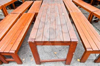 empty wooden table in outdoor restaurant