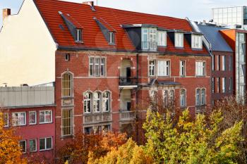 brick facade of residential building of 19th century in Berlin in autumn morning