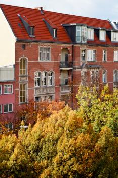 brick facade of residential house of 19th century in Berlin in autumn morning