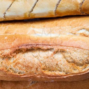 background from fresh baked loaves of bread close up