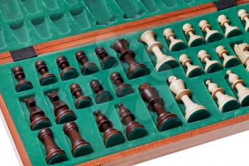 set of chess pieces packed in box close up