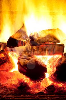 burning wood in fireplace in evening time