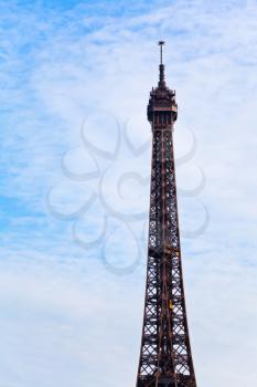 Eiffel tower with blue sky and white clouds in Paris