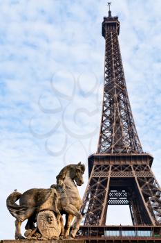 Eiffel tower and statue of jena bridge in Paris