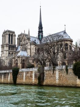 view of cathedral Notre Dame de Paris in overcast day