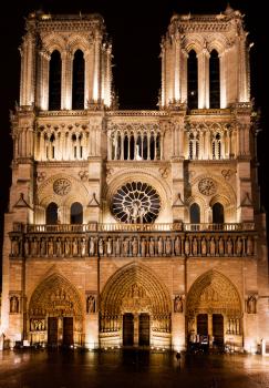 facade of cathedral Notre-Dame de Paris at night