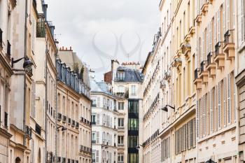 Paris buildings in cloudy spring day