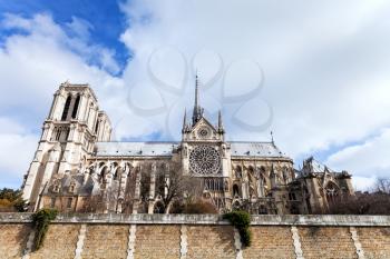 cathedral Notre-Dame de Paris from Seine River in cloudy day