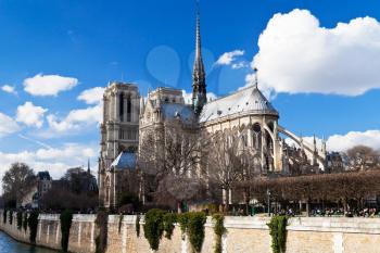 view of cathedral Notre-Dame de Paris and Seine River in spring