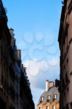 blue spring sky between houses in Paris