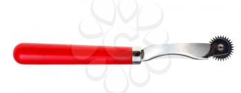 tracing wheel with red plastic handle isolated on white background